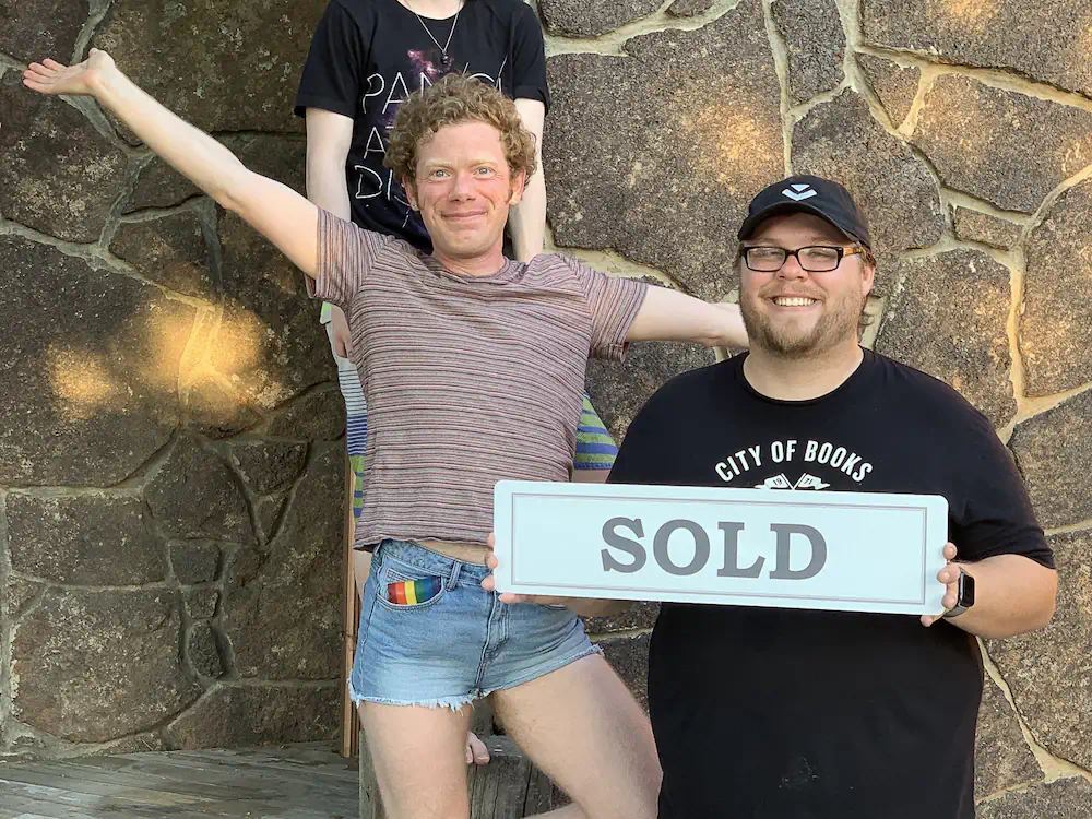 Nick and friends celebrating the purchase of their new urban farm in West Boise, a midcentury rambler on 1.5acres!